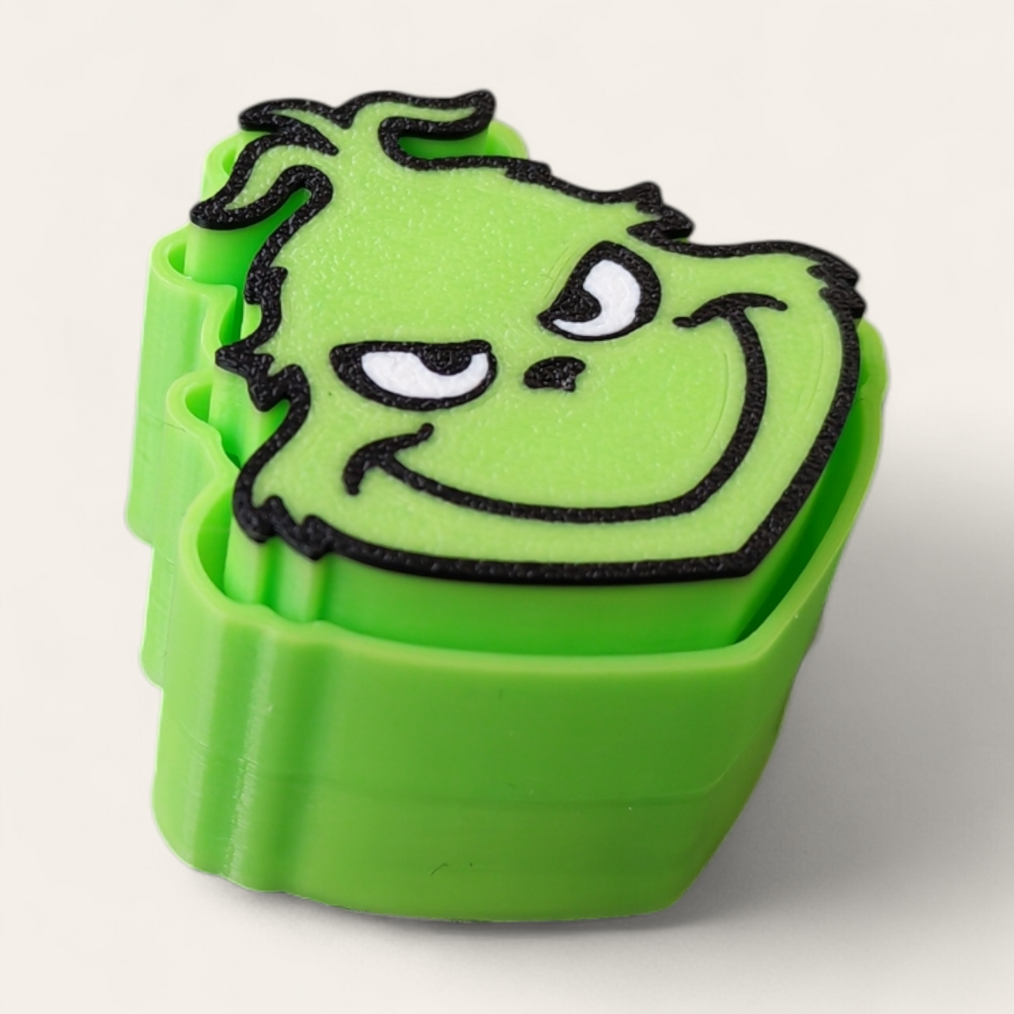 Clicker Fidget Toy – El Grinch 🎄💚